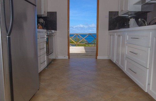 St. Patrick House | Secluded villa overlooking black sand beach