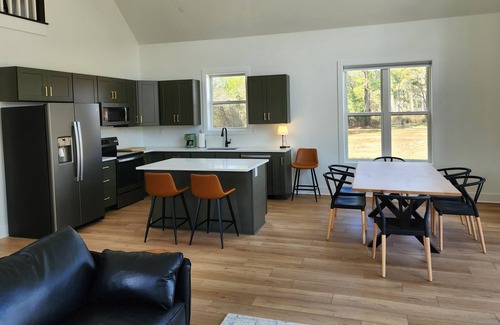 Marion Station House | Secluded waterfront getaway with hot tub,fire pit, and private dock.