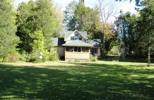 South Hero Cottage | Secluded, Wooded & Dog Friendly Home on Lake W/Casual Decor
