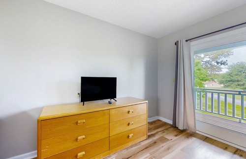 Baneberry Apartment | Second-floor studio with quiet view, patio & gym - walk to Douglas Lake, dogs OK