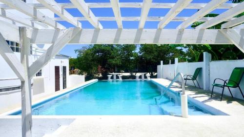 Belize City Apartment | See Belize RELAXING Studio with Sea View Infinity Pool & Overwater Deck