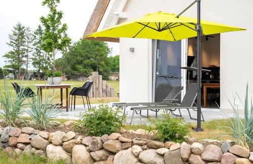 Am Salzhaff House | Seegras - Ferienhaus mit Kamin, Sauna und Meerblick