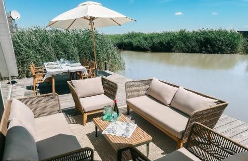 Rust House | Seehütte Sonnenschilf - Premium Hide-Away Ferienhaus in Rust direkt am Neusiedlersee