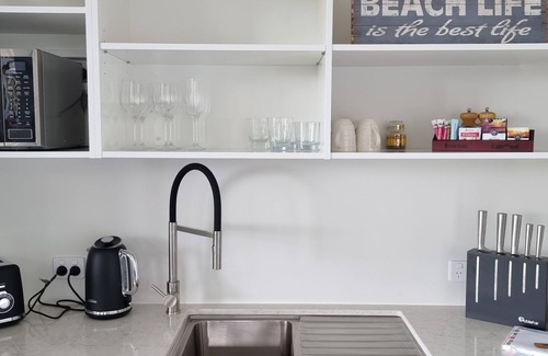 Russell Apartment | Self contained studio room with private entrance and stunning sea views