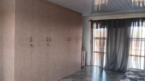Greater Johannesburg Metropolitan Area Apartment | Self serviced cute and comfy nestled in the heart of lenasia