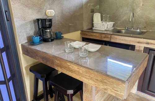 Rio Cuarto de Grecia Cabin | Selva Negra Loft: surrounded by mountains, rivers, lakes, and lush wildlife.