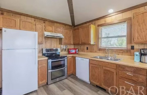 Sea Oats House | Semi oceanfront 4 bedroom home in Salvo! It’s pet friendly. Walk to the beach.