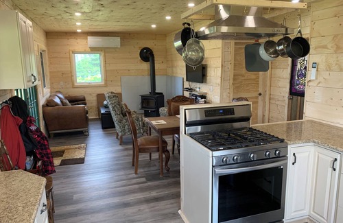 Prince County Cottage | Semi-private beach, huge screened deck, woods on fenced property