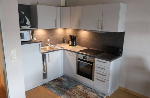 Sahlenburg Apartment | Send apartment in the best location 150m from Beach, free WiFi, large swimming pool, sauna