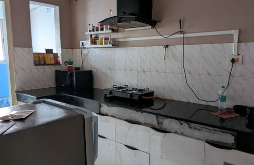 Gauhati Apartment | Seneh Homes - An Assamese homestay experience with WiFi, Views, & AC in Guwahati