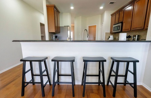 McKinney House | Serene 4-bedroom house with BBQ, 5-TVs in McKinney facing Park & Pond sleep 12