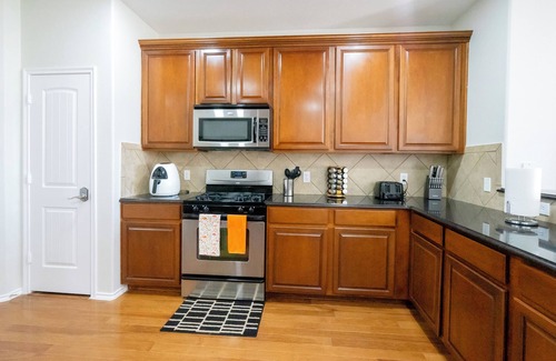 McKinney House | Serene 4-bedroom house with BBQ, 5-TVs in McKinney facing Park & Pond sleep 12