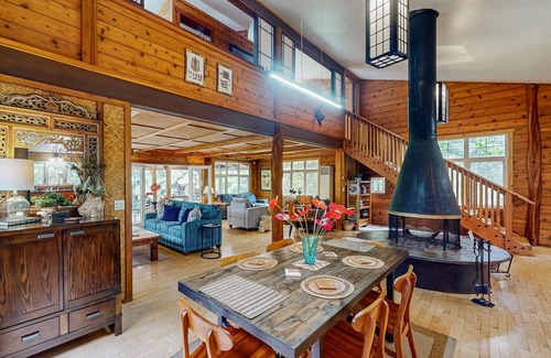 Volcano House | Serene 5-acre tropical hideaway with lanai and circular wood-burning fireplace