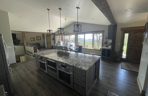 Richmond Hill Corridor House | Serene and sunny paradise with Pikes Peak views, chef’s kitchen & Trager