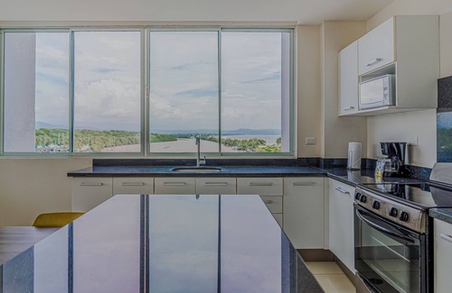 Puntarenas Condo | Serene condo with ocean views, modern amenities & pool access