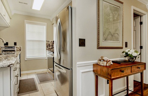 Waterford Plantation Condo | Serene lakefront condo with pool full kitchen, pond and golf course view, & W/D
