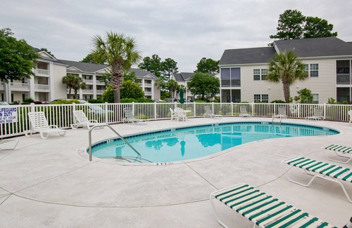 Waterford Plantation Condo | Serene lakefront condo with pool full kitchen, pond and golf course view, & W/D