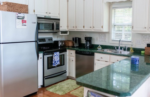 Eatonton House | Serene Lakefront Home with Private Dock, Hot Tub, Fire Pit and Boat!