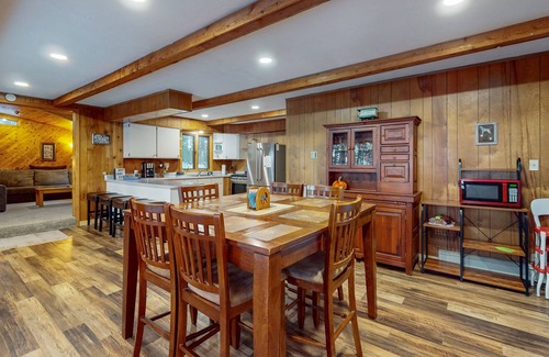 Lake Tomahawk House | Serene Lakefront Home with Fire pit, Dock, WIFI, & Dog-Friendly