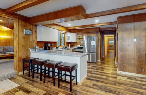 Lake Tomahawk House | Serene Lakefront Home with Fire pit, Dock, WIFI, & Dog-Friendly