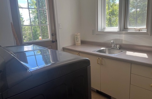 Timmins House | Serene & Luxurious basement apartment.