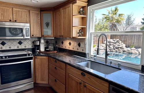 Nut Tree House | Serene Retreat: W/Waterfall Pool, Proximity to Shopping & Gastronomic Delights.