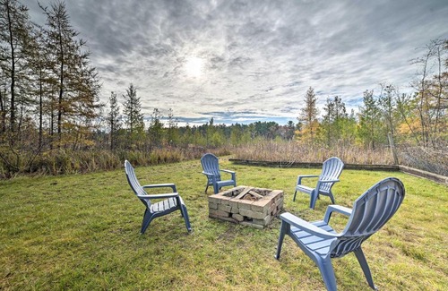 Rapid City House | Serene Riverfront Home with Torch Lake Access!