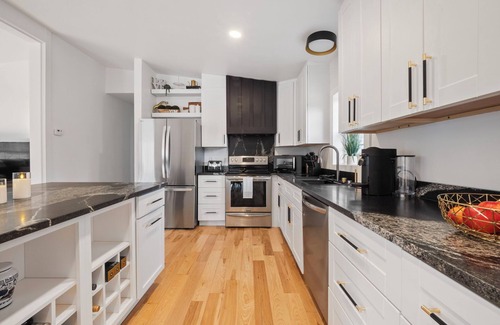 Rapid City House | Serene, Spacious Riverfront Home close to Torch Lake with lots of Entertainment