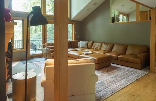 Suttons Bay House | Serene Suttons Bay Home with Fire Pit and Wooded Yard