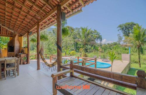 Mambucaba House | Seu refúgio com piscina, área verde e Churrasqueira