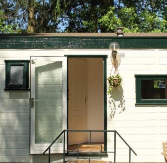 Vorden Ski Chalet | Sfeervol vakantiehuisje in bosrijke omgeving