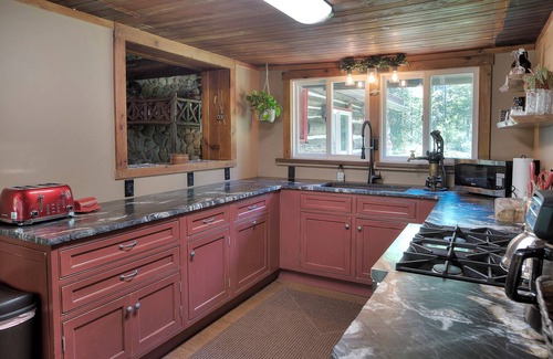 Mayfield Cabin | Shadowland River Lodge on Boardman River - Pet Friendly - Acreage - Private