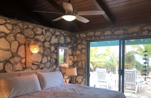 Bennett's Harbour House | Shangri-La- beach front views of crystal-clear blue waters and surreal sunsets.