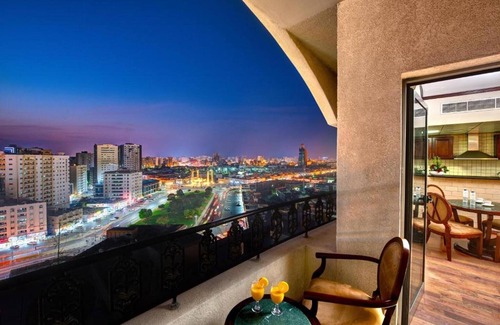Sharjah House | Sharjah Views + Deluxe King | Tulip Escape