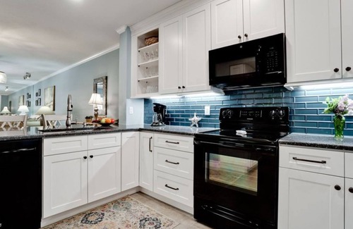 Holmes Beach Condo | Shell Game: Playa Encantada - Beachfront Community Steps to the Beach