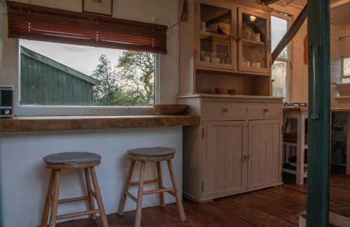 Cowbridge Ski Chalet | Shepherds Hut in enclosed field