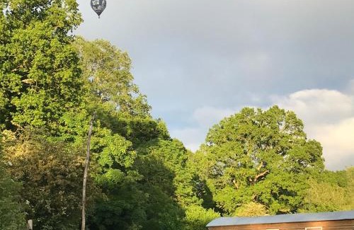 Stoke-sub-Hamdon Hotel | Shepherds Huts Ham Hill, 2 double beds, Bathroom, Lounge, Diner, Kitchen, LOVE dogs & Cats Looking out to lake and by Ham Hill Country Park plus parking for large vehicles available also great deals on workers long term This is the place to relax and BBQ