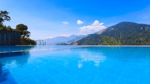 Suryanelli Resort | Shola Crown Resort - Munnar