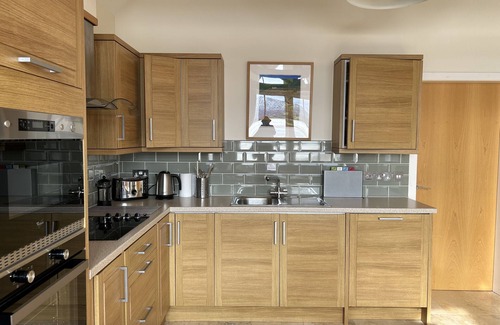 Durness Cottage | Shore Cottage -The sea and the sky become one in this gem of a cottage.
