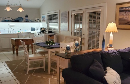 Union Pier Cottage | Shorewinds beachhouse Garden Gate opens directly to beachpath No roads to cross!