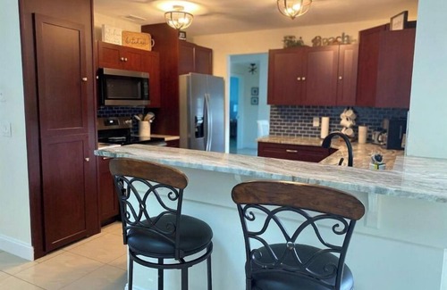 Port Malabar House | Short drive to the beach, or stay by the pool.