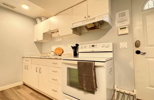 Calgary Apartment | Short or Long Term | Pet Friendly | Dog Park | King Bed | Workspace for 2