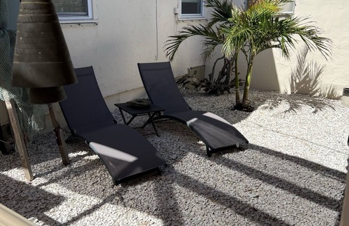 Whitney Beach House | Short walk to beach or take your boat from the canal /dock in your backyard!