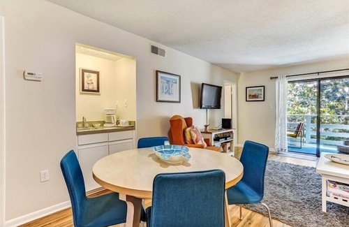 Fernandina Beach Condo | Short walk to beach. Open kitchen, dining room and living room spills out onto the private balcony