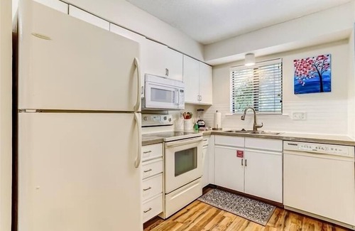 Fernandina Beach Condo | Short walk to beach. Open kitchen, dining room and living room spills out onto the private balcony