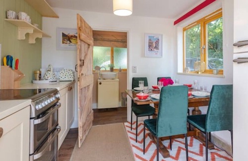 Halfway House House | Shrawardine Station Train Carriage sleeps 4 Fishing and Wild Swimming