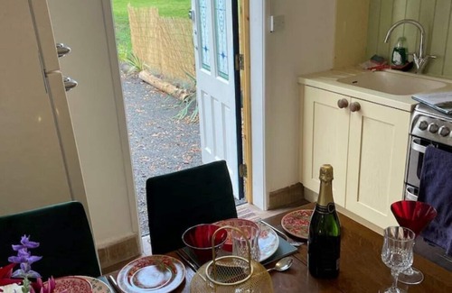 Halfway House House | Shrawardine Station Train Carriage sleeps 4 Fishing and Wild Swimming