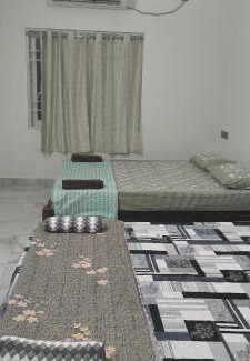 Gokarna House | Shri Virajita - Budget AC twin bed- room
