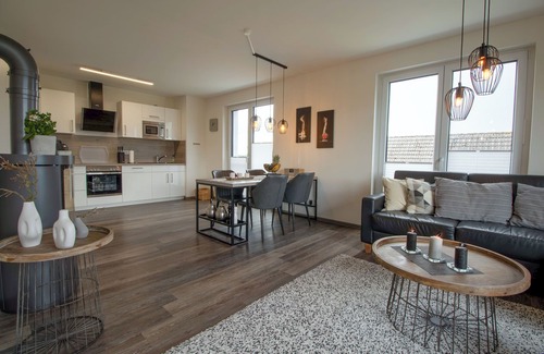 Fedderwardersiel Apartment | Sielhuus 11 Ferienwohnung mit Dachterrasse und Infrarotsauna und Kamin für bis zu 4 Personen in Fedderwardersiel!