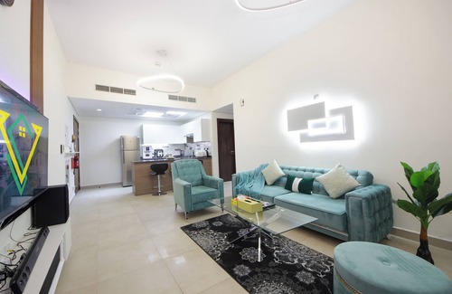 Discovery Gardens Apartment | Silk Valley - Brand new 1B with pool view